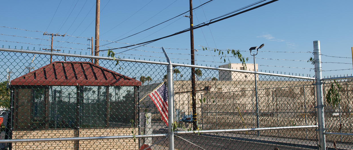 Chain Link Fence Constructio with Toll both in backround